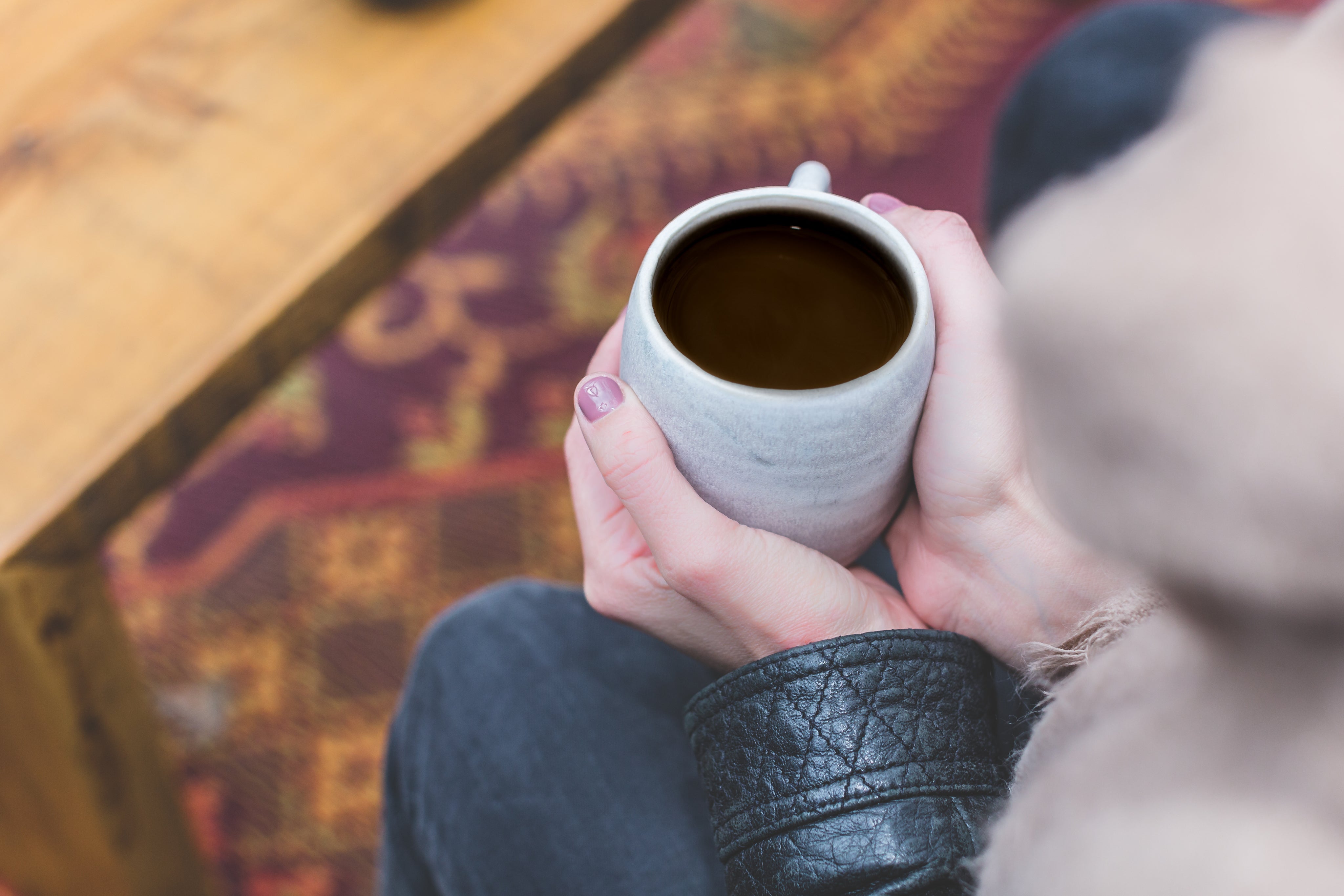 files/womans-hands-holding-coffee.jpg